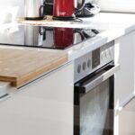 how to paint unfinished wood kitchen cabinets
